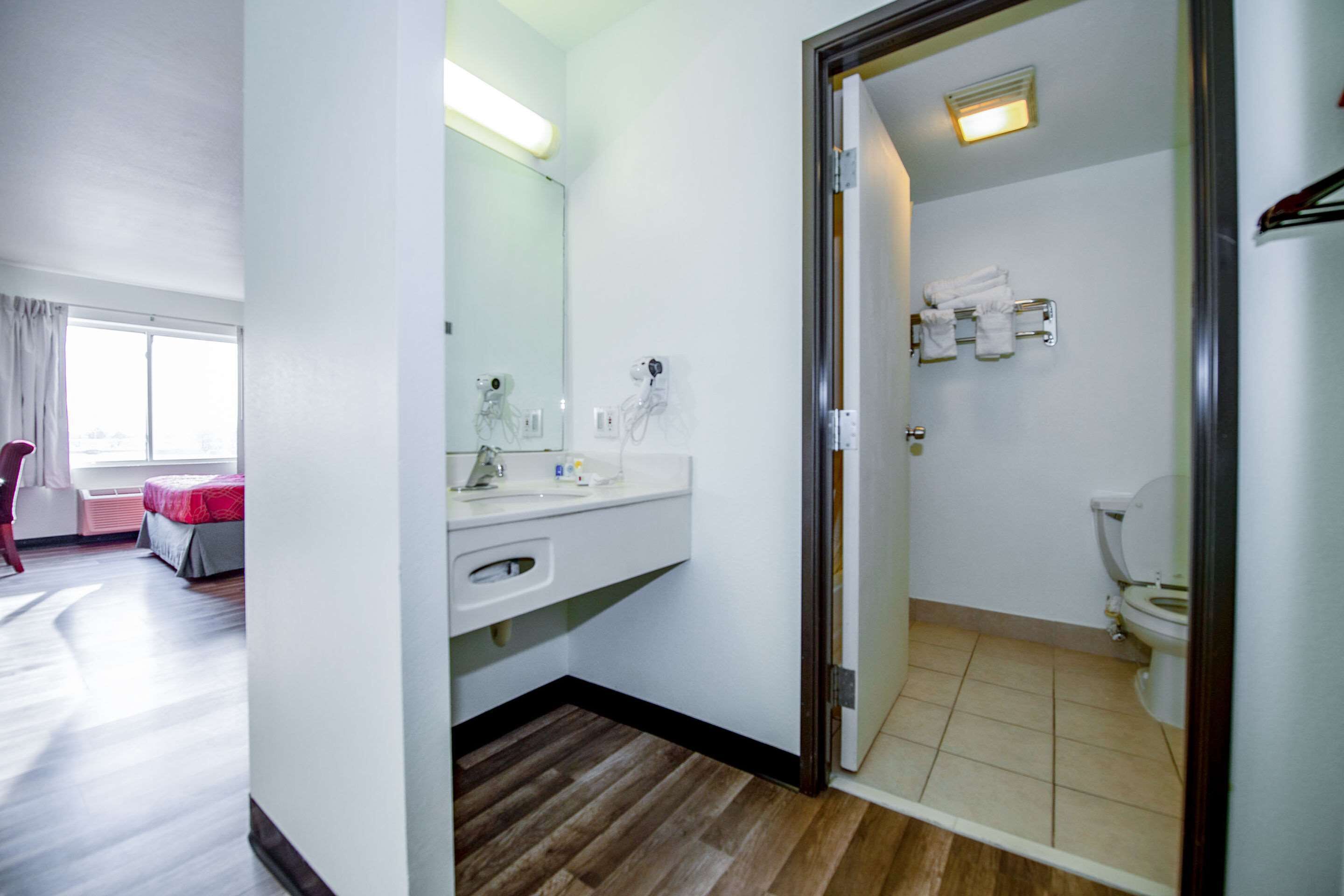 desk, blackout curtains, iron/ironing board, rollaway beds