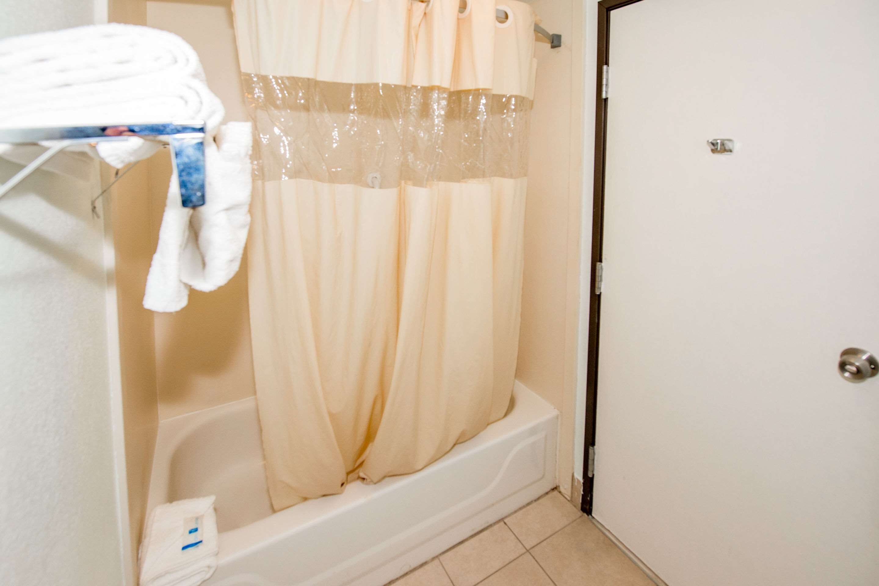 desk, blackout curtains, iron/ironing board, rollaway beds