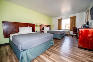 Desk, blackout drapes, iron/ironing board, rollaway beds