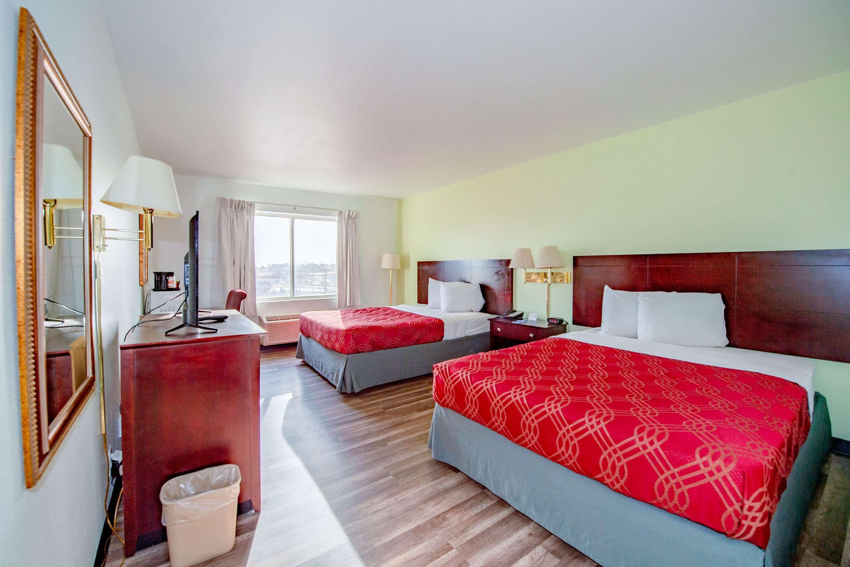 standard room, 2 queen beds, non smoking | desk, blackout curtains, iron/ironing board, rollaway beds