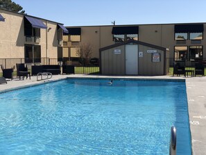 Seasonal outdoor pool, open 11:00 AM to 10:00 PM, sun loungers