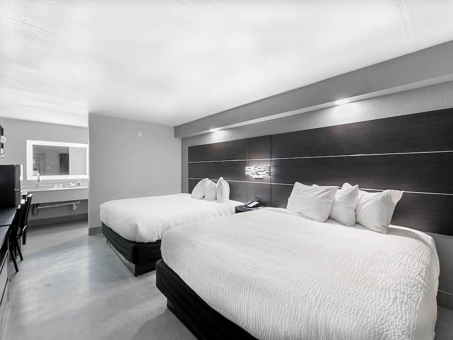 Suite, Multiple Beds, Non Smoking | Pillowtop beds, desk, iron/ironing board, free cribs/infant beds