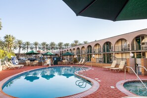 Outdoor pool, a heated pool, sun loungers