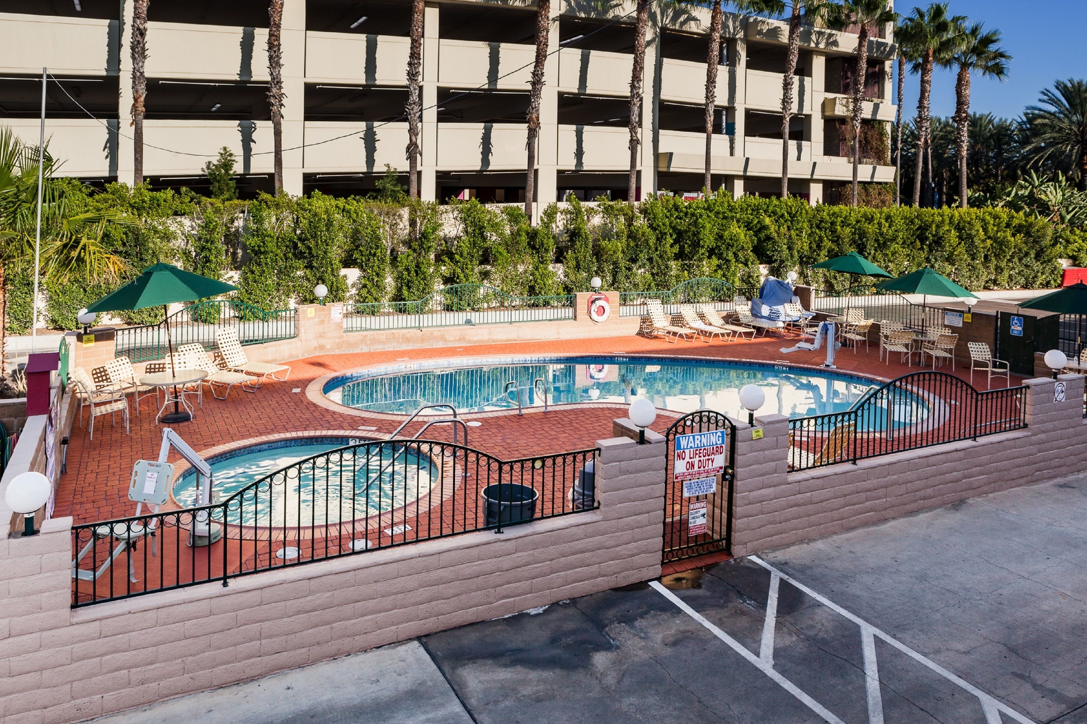 outdoor pool, a heated pool, pool loungers