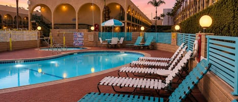 Outdoor pool, a heated pool, pool loungers