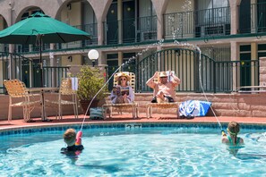 Outdoor pool, a heated pool, sun loungers