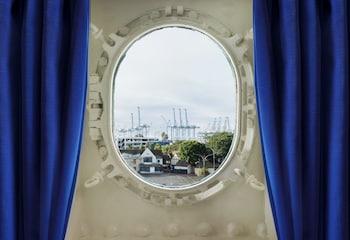 Hotel room view looking out at The Queen Mary