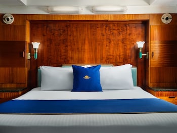 Hypo-allergenic bedding, pillowtop beds, individually decorated at The Queen Mary