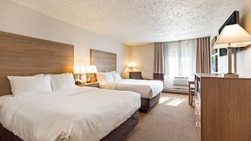 Desk, laptop workspace, cots/infant beds, rollaway beds