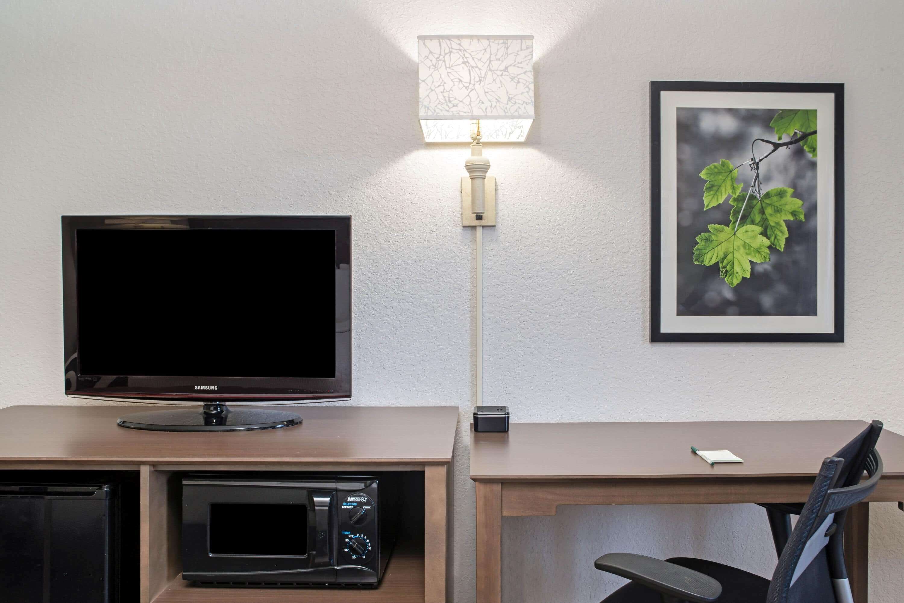 premium bedding, down duvets, desk, laptop workspace