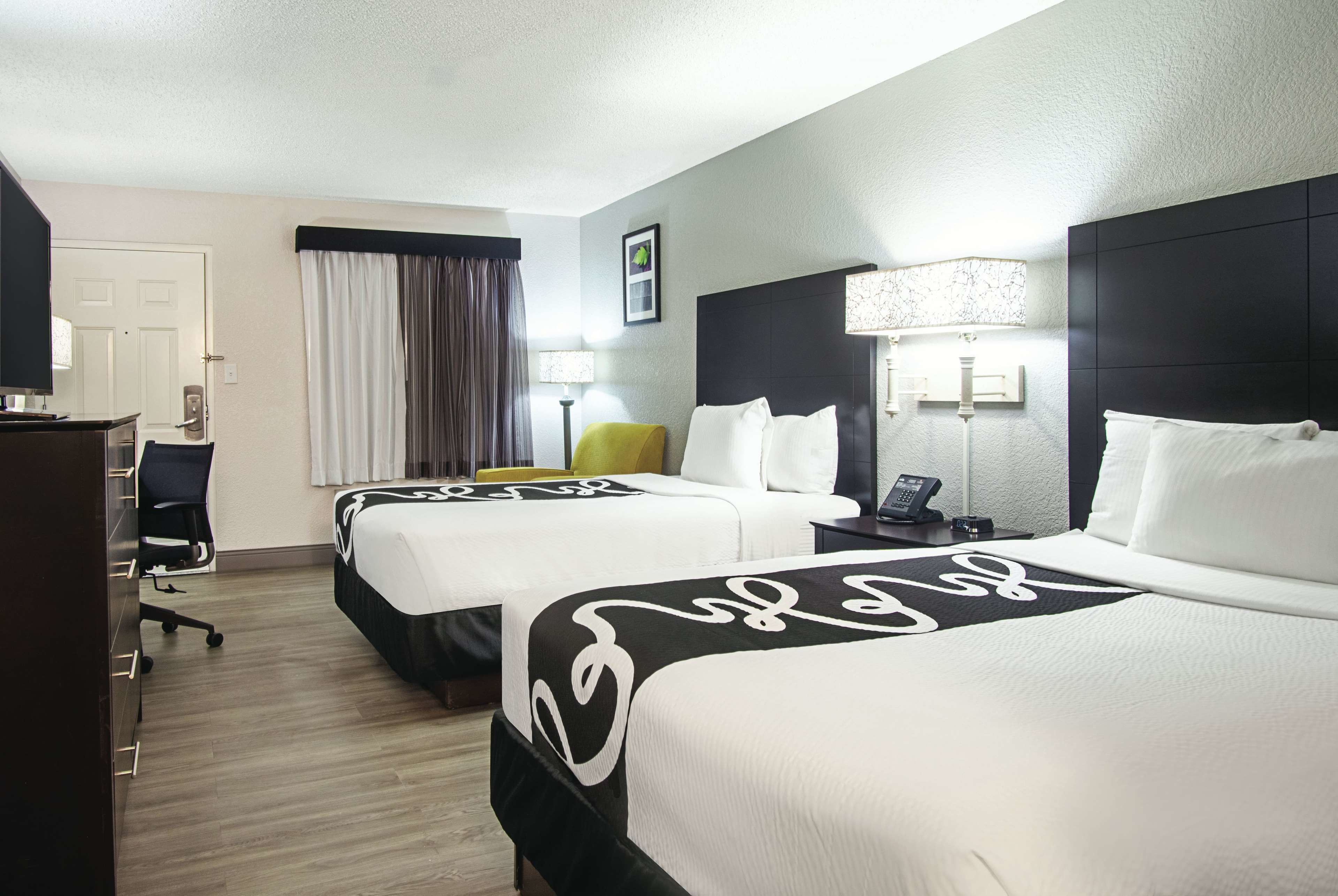 premium bedding, down duvets, desk, laptop workspace