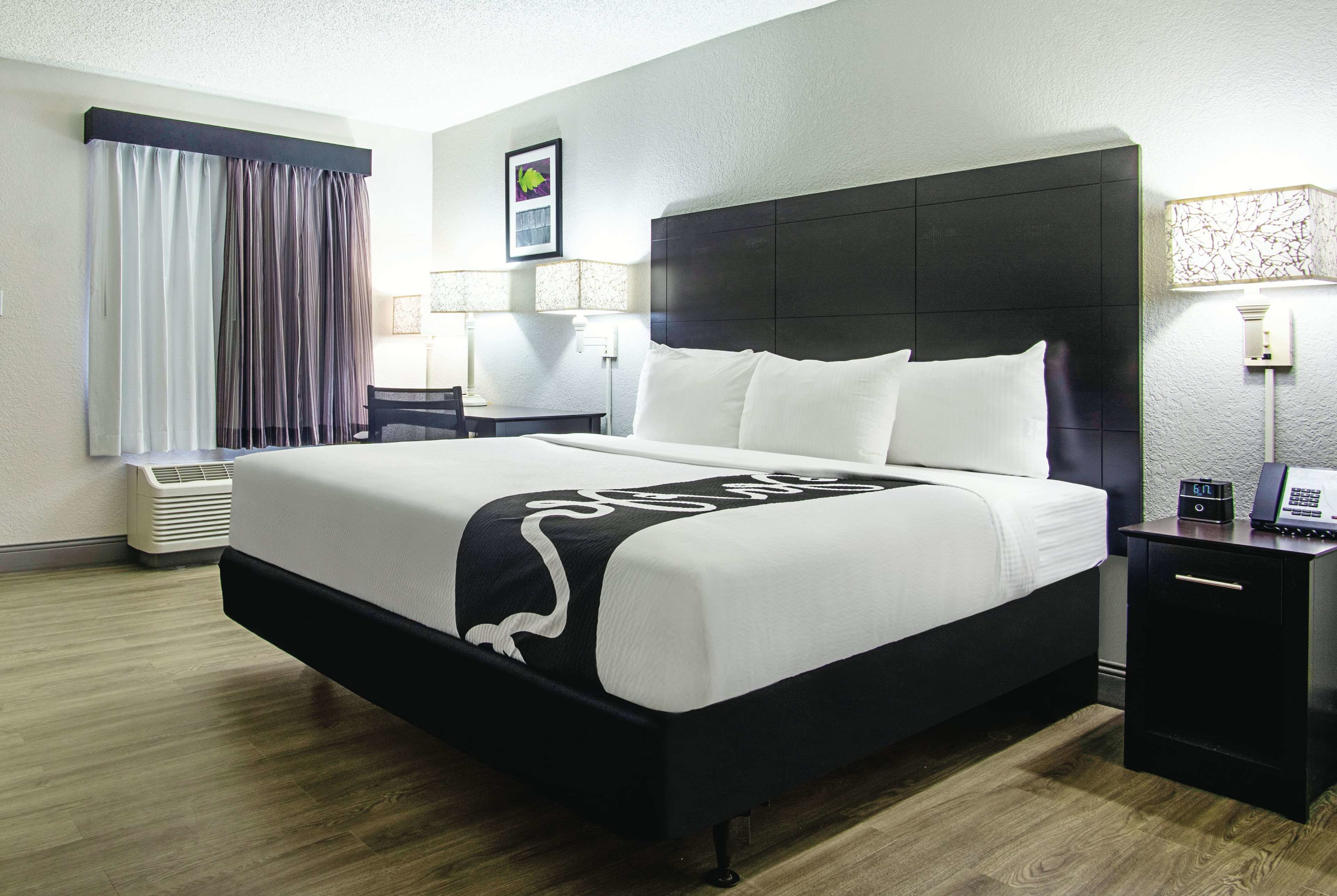 premium bedding, down duvets, desk, laptop workspace