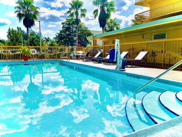 Outdoor pool, open 8:00 AM to 8:00 PM, pool umbrellas, pool loungers