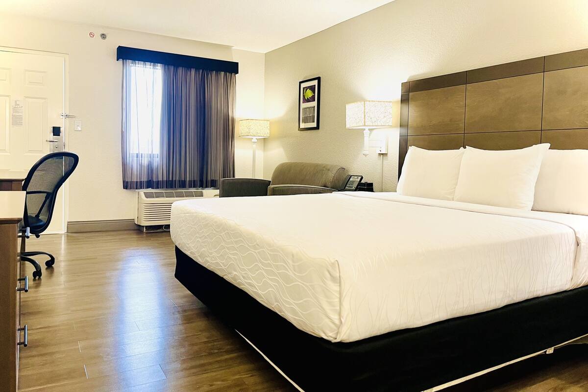 Premium bedding, down duvets, desk, laptop workspace