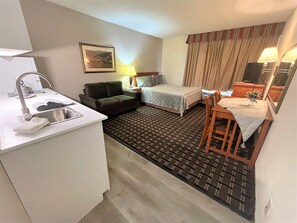 Standard Studio Suite, 1 Queen Bed, Non Smoking, Kitchenette | Desk, blackout drapes, iron/ironing board, free WiFi