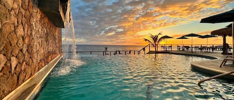 Outdoor pool, pool umbrellas, pool loungers
