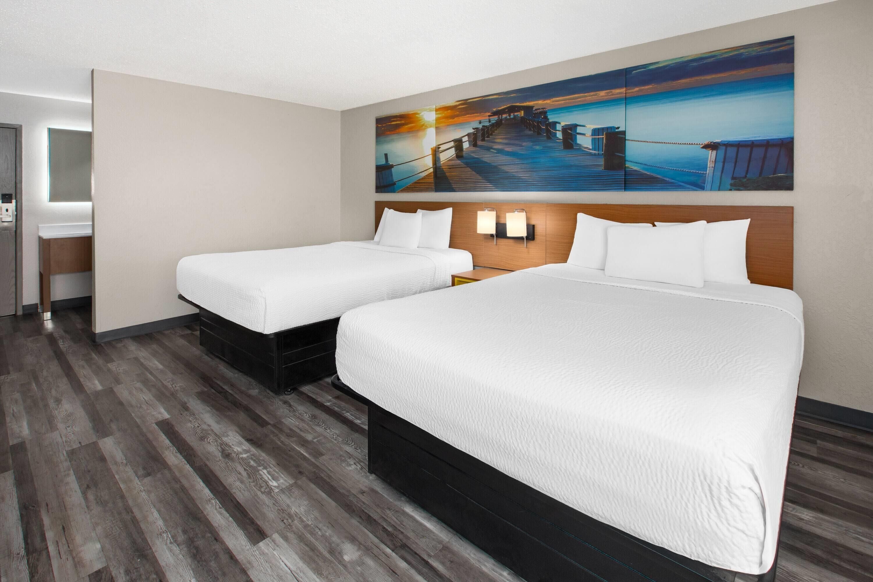 Quarto standard, 2 camas Queen | Individualmente mobiliados, escrivaninha