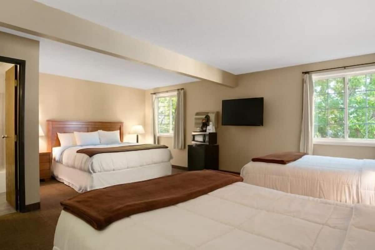 Individually furnished, desk, laptop workspace, blackout drapes