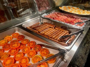 Desayuno buffet (AUD 25 por persona) 