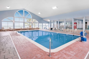 Indoor pool, open 7:00 AM to 10:00 PM, sun loungers