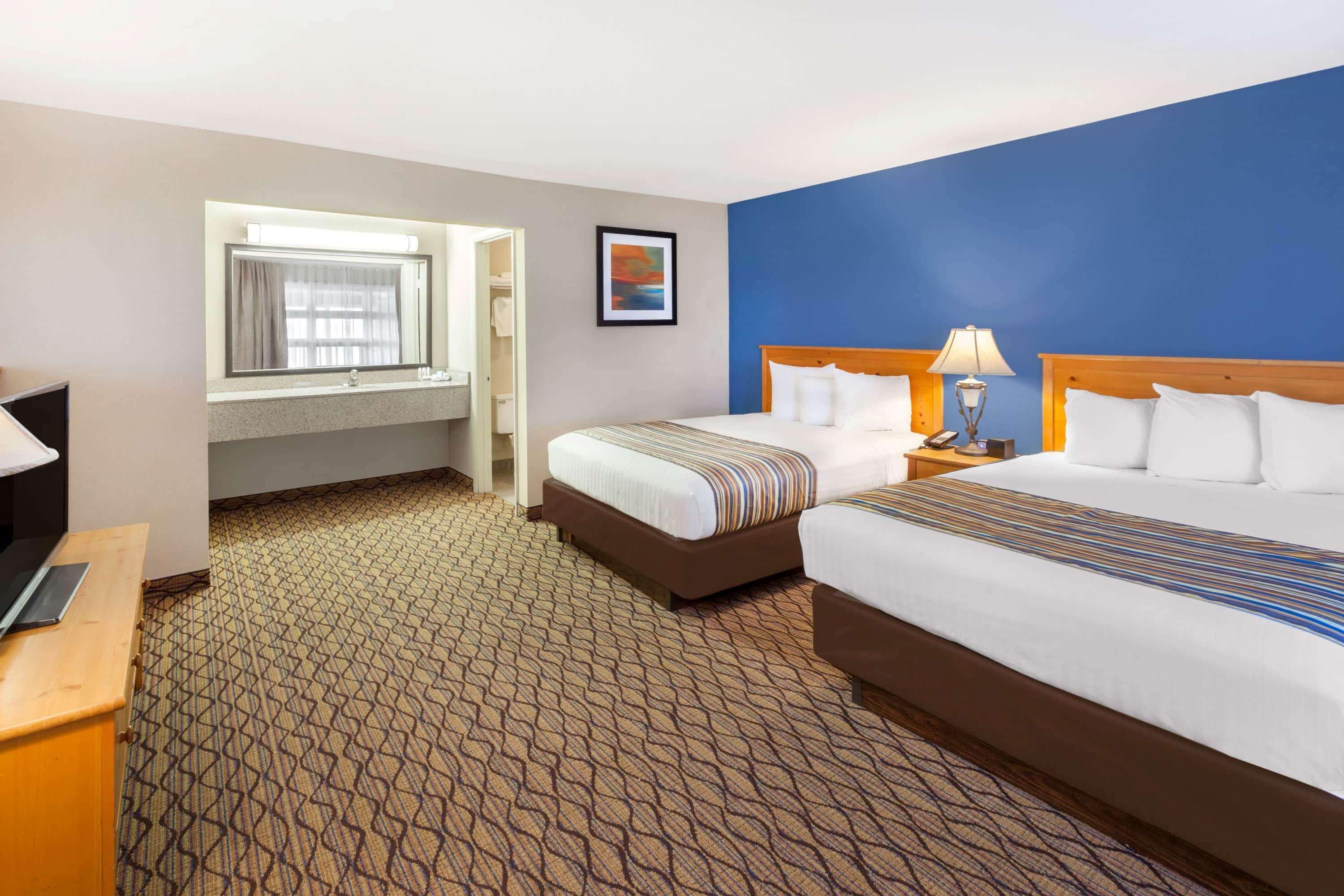 Standard Studio Suite, 2 Queen Beds and Sofa Bed, Courtyard View | Desk, iron/ironing board, free cribs/infant beds, free WiFi
