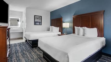 Tabla de planchar con plancha, wifi gratis y ropa de cama