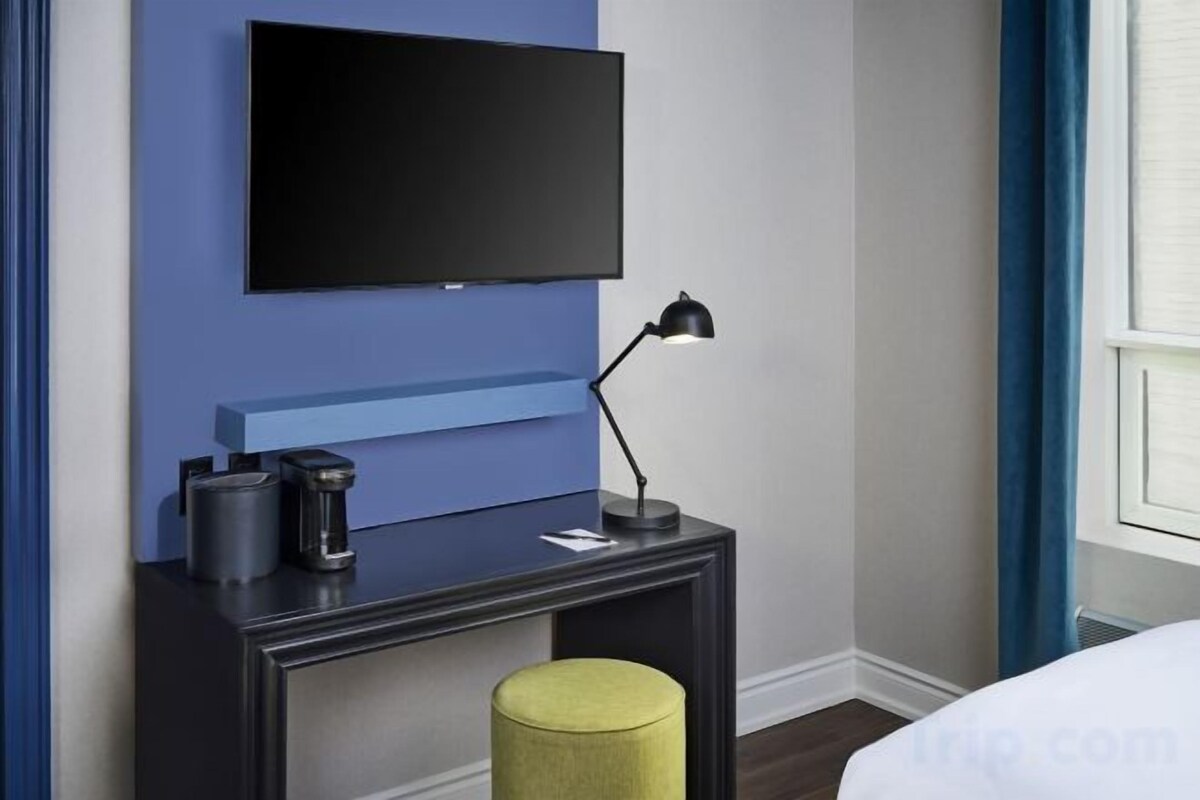 Pillowtop beds, desk, blackout drapes, iron/ironing board
