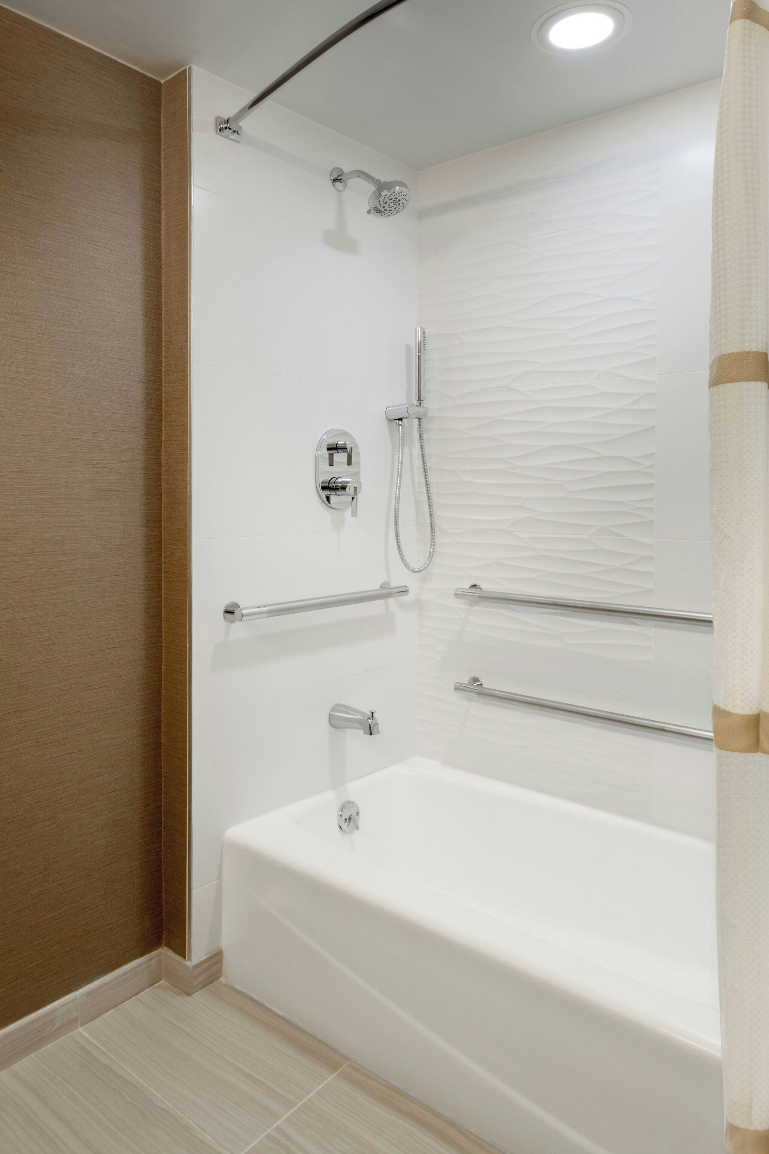 combined shower/bathtub, free toiletries, hair dryer, towels