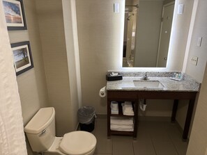 Suite, 1 King Bed, Non Smoking (Efficiency) | Bathroom | Combined shower/bathtub, hydromassage showerhead, free toiletries - Wingate by Wyndham Utica (Utica)