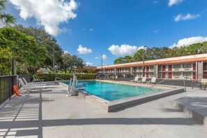Outdoor pool, pool umbrellas, pool loungers