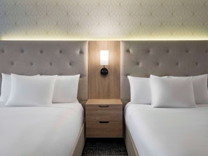 Premium bedding, down duvets, in-room safe, desk