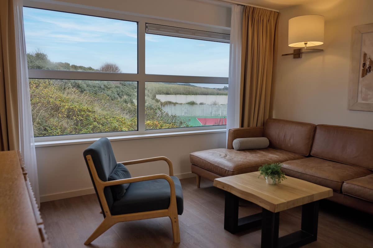 Family Room | In-room safe, laptop workspace, blackout curtains, free WiFi