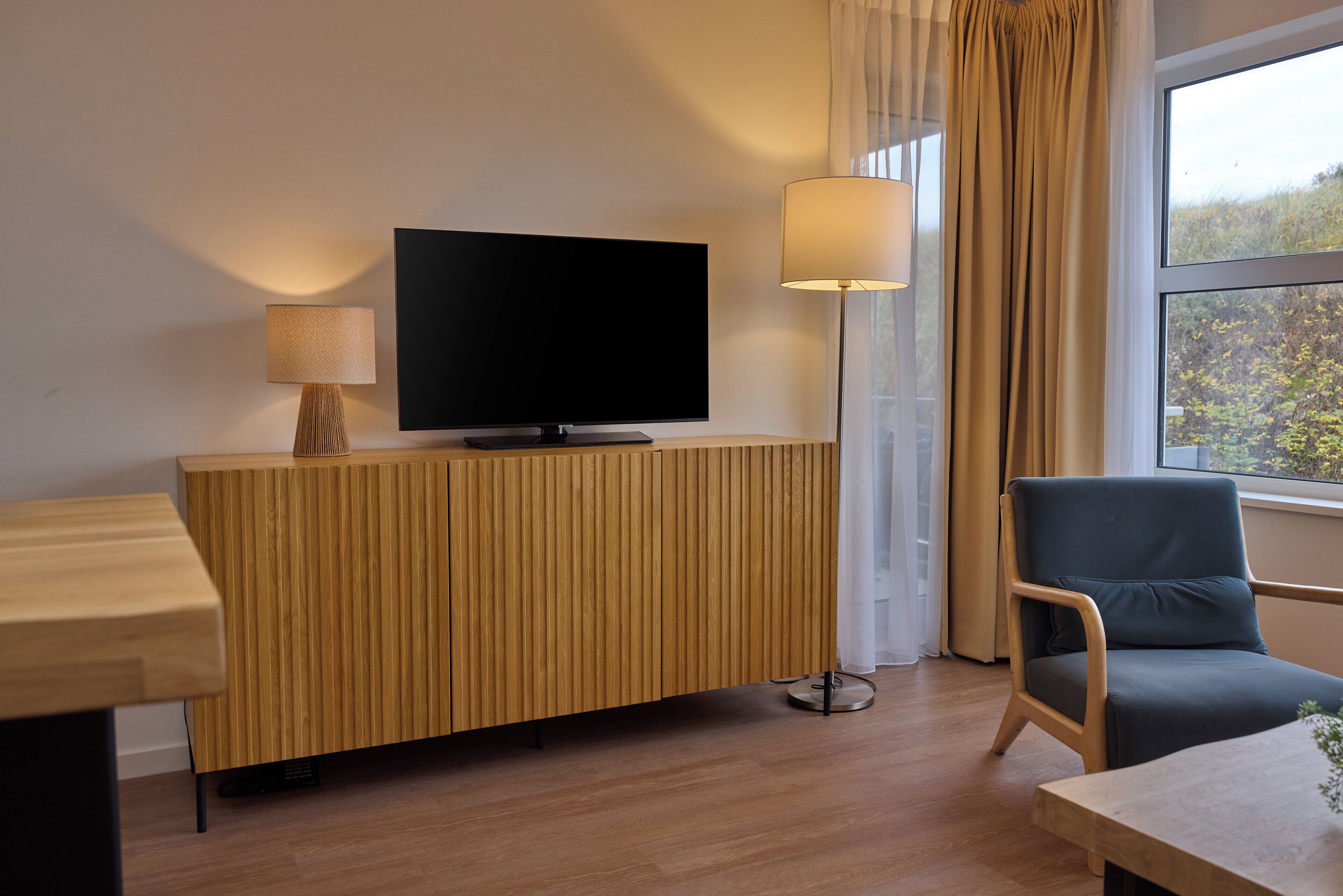 family room | 1 bedroom, in-room safe, laptop workspace, blackout curtains