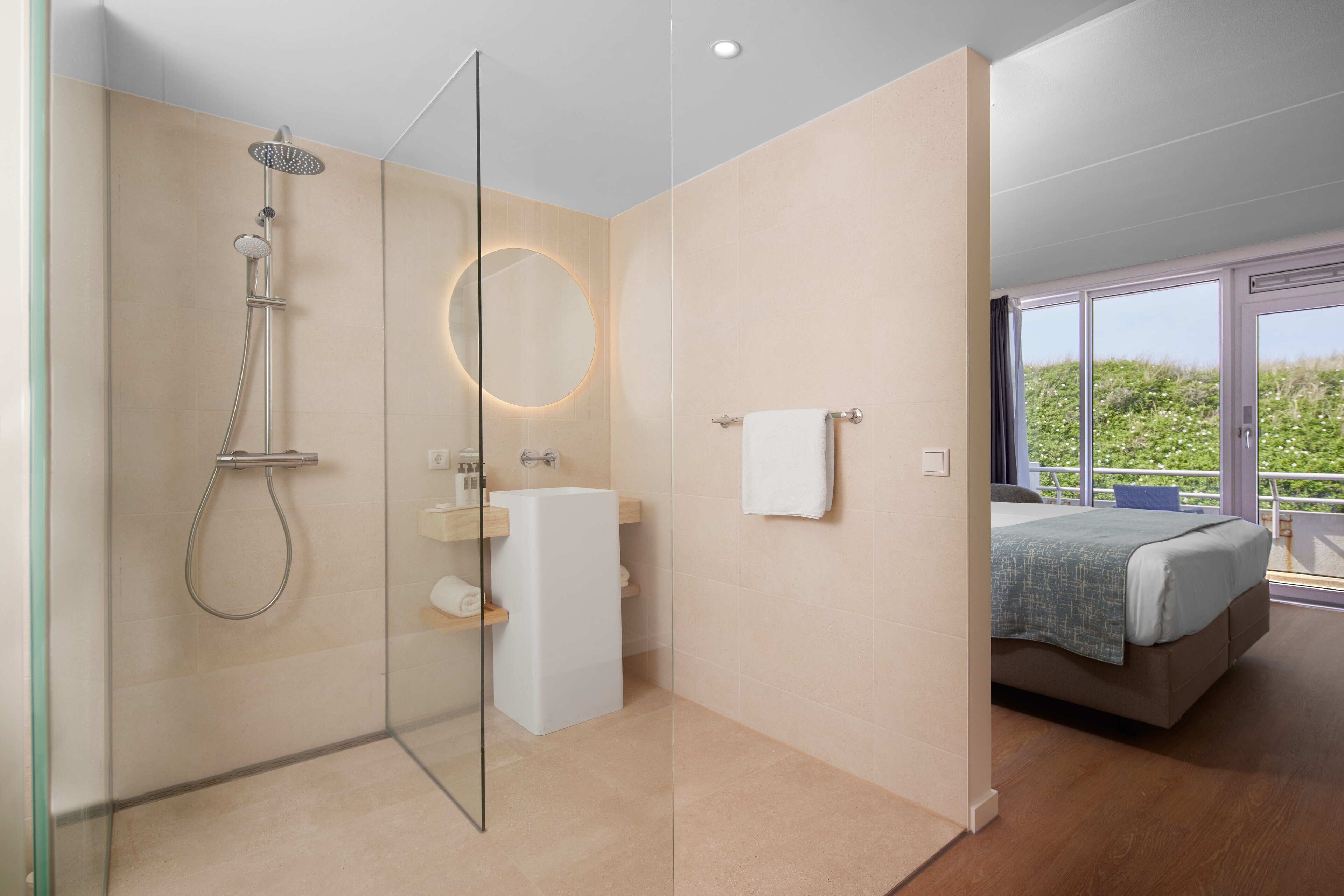superior double room | bathroom | eco-friendly toiletries, hair dryer, towels
