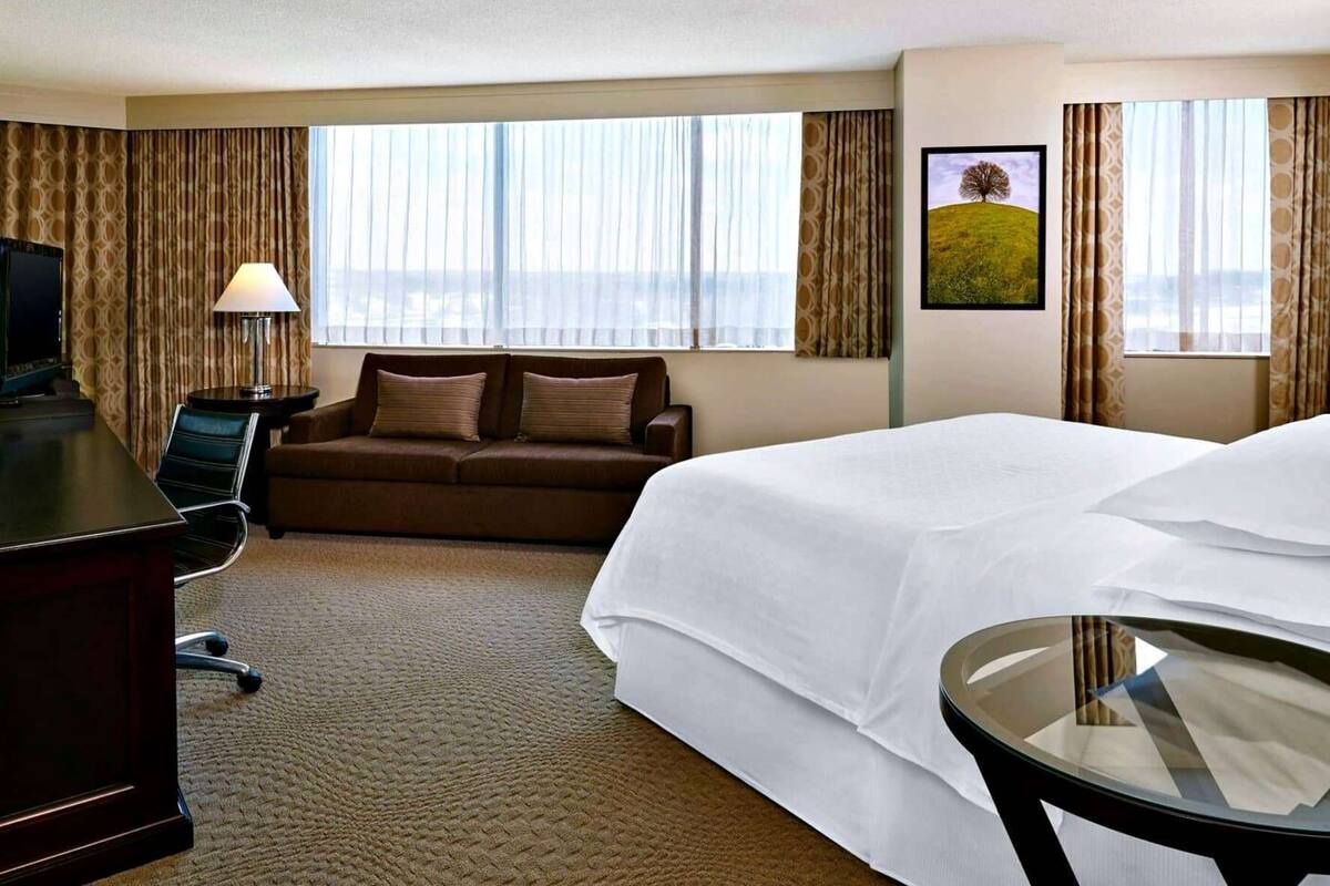 Premium bedding, down duvets, pillow-top beds, in-room safe