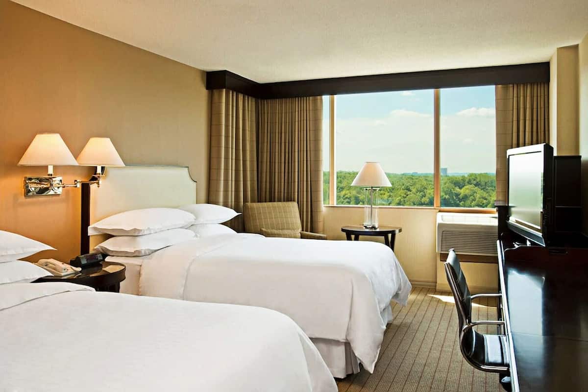 Premium bedding, down duvets, pillow-top beds, in-room safe