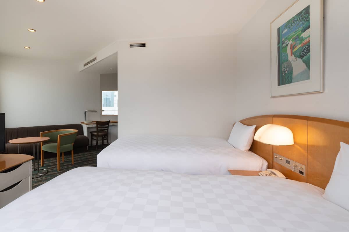 Main Tower Corner Twin Room with Sofa, Non-Smoking (6th-16th floors) | In-room safe, laptop workspace, iron/ironing board, free WiFi