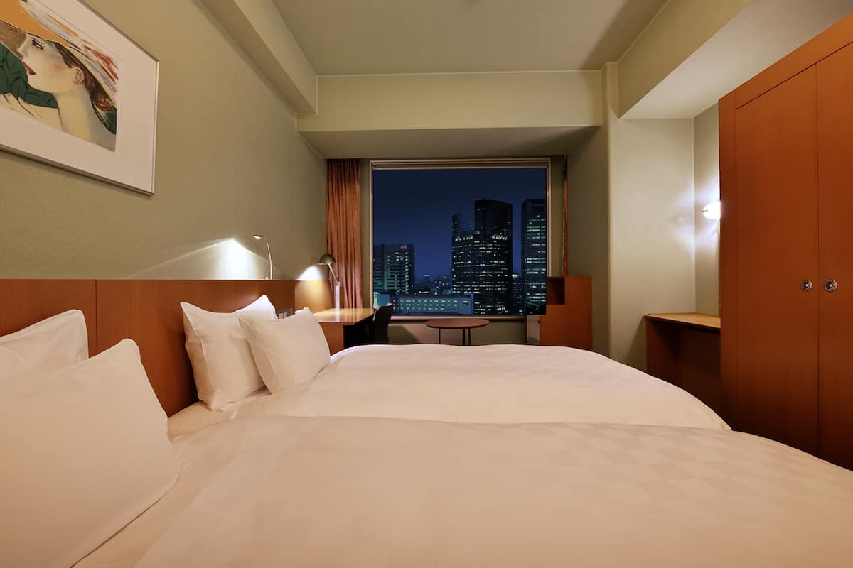 Annex Tower Twin Room, Non-Smoking (9th-14th Floors) | In-room safe, laptop workspace, iron/ironing board, free WiFi