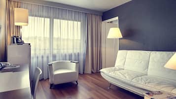 Desk, blackout drapes, soundproofing, free cribs/infant beds