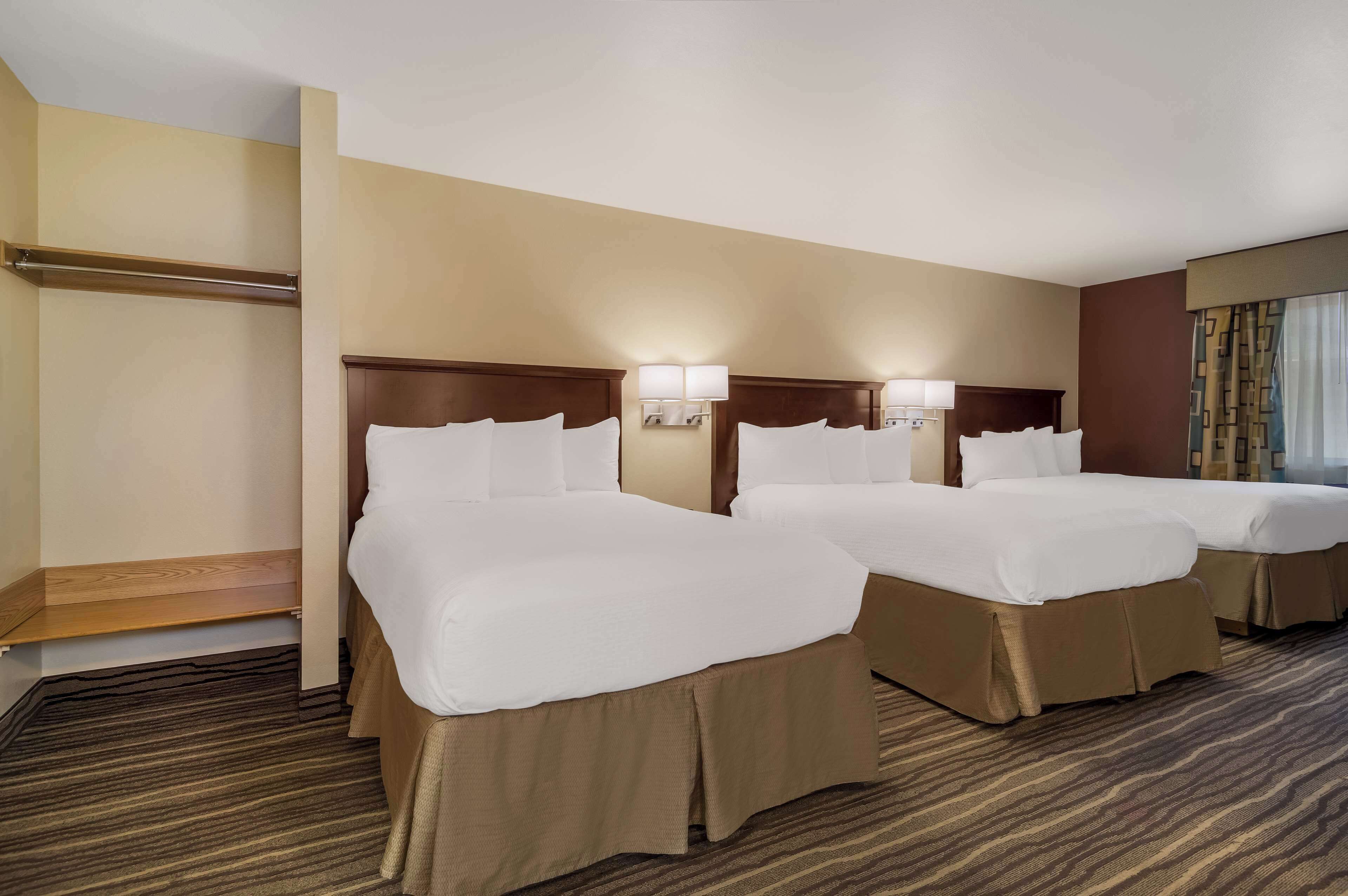 standard room, 2 double beds, non smoking, refrigerator & microwave (with sofabed) | in-room safe, desk, laptop workspace, iron/ironing board