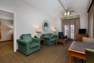 Suite, 1 King Bed, Non Smoking | Pillowtop beds, desk, blackout drapes, iron/ironing board