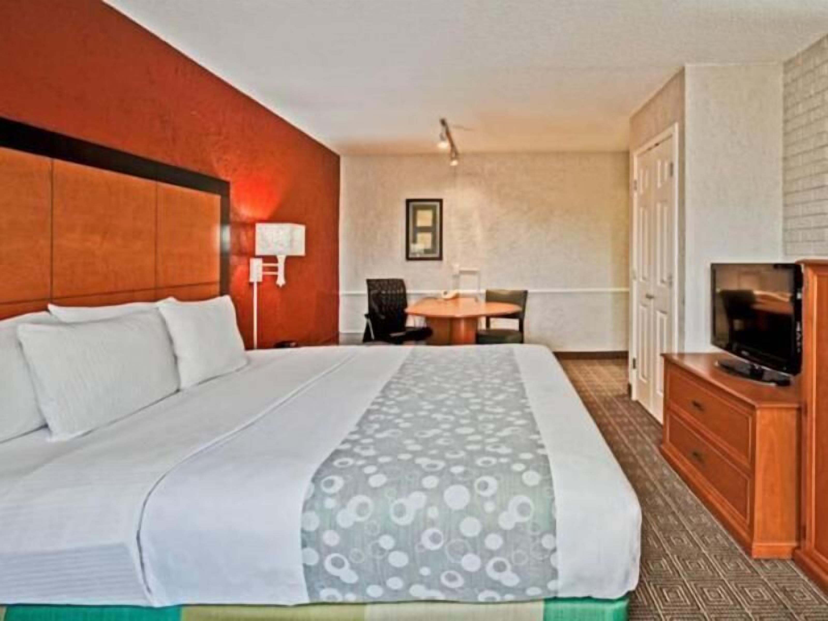 Pillowtop beds, desk, blackout drapes, iron/ironing board