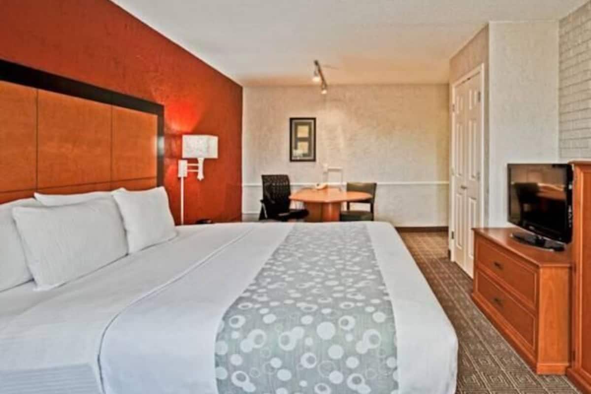 Pillowtop beds, desk, blackout drapes, iron/ironing board