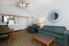 Suite, 1 King Bed, Non Smoking | Pillowtop beds, desk, blackout drapes, iron/ironing board