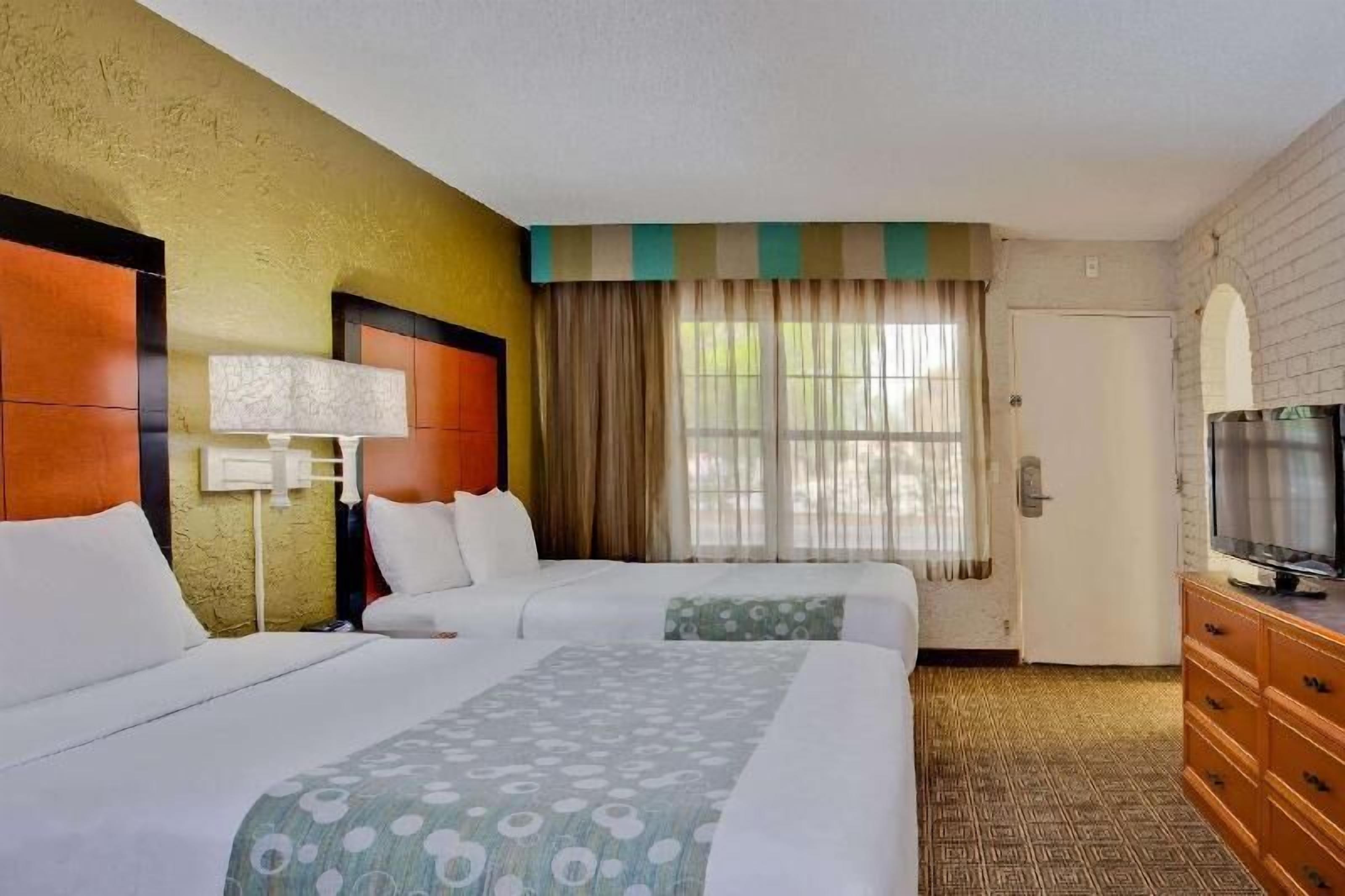 Pillowtop beds, desk, blackout drapes, iron/ironing board
