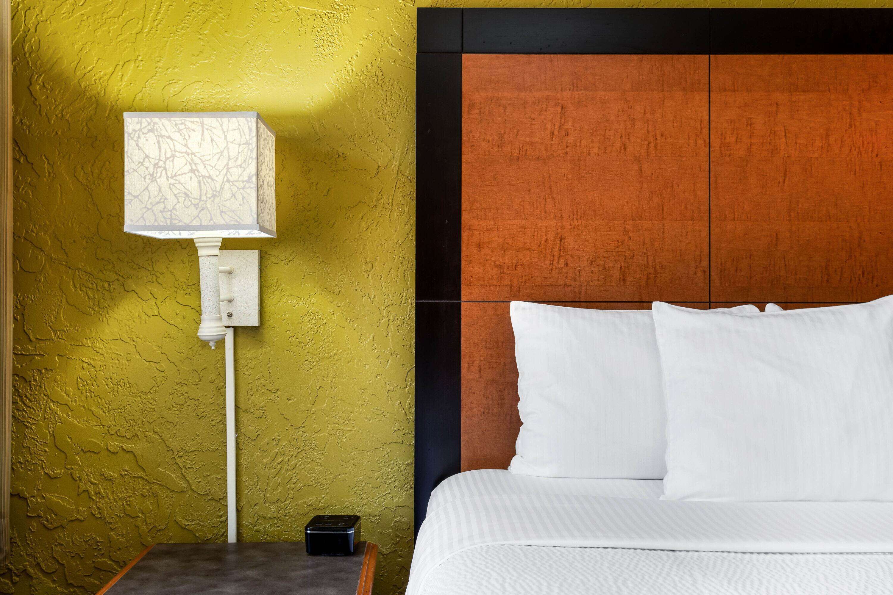 pillow-top beds, desk, blackout curtains, iron/ironing board