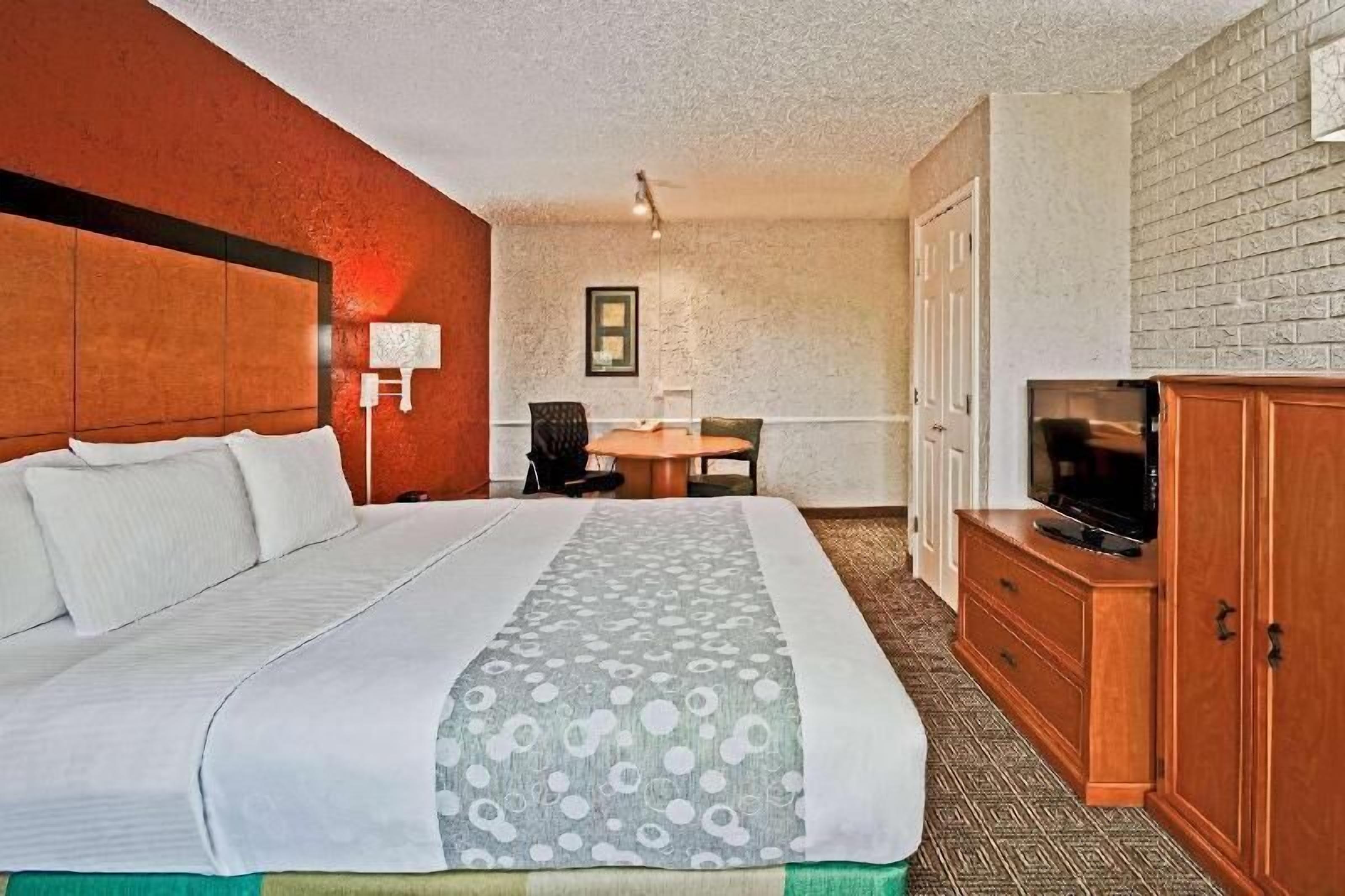 Pillowtop beds, desk, blackout drapes, iron/ironing board