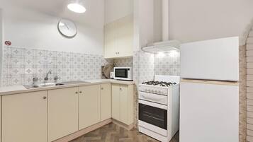 Apartemen, 2 kamar tidur | Dapur pribadi | Lemari es, microwave, mesin pembuat kopi/teh, dan ketel listrik