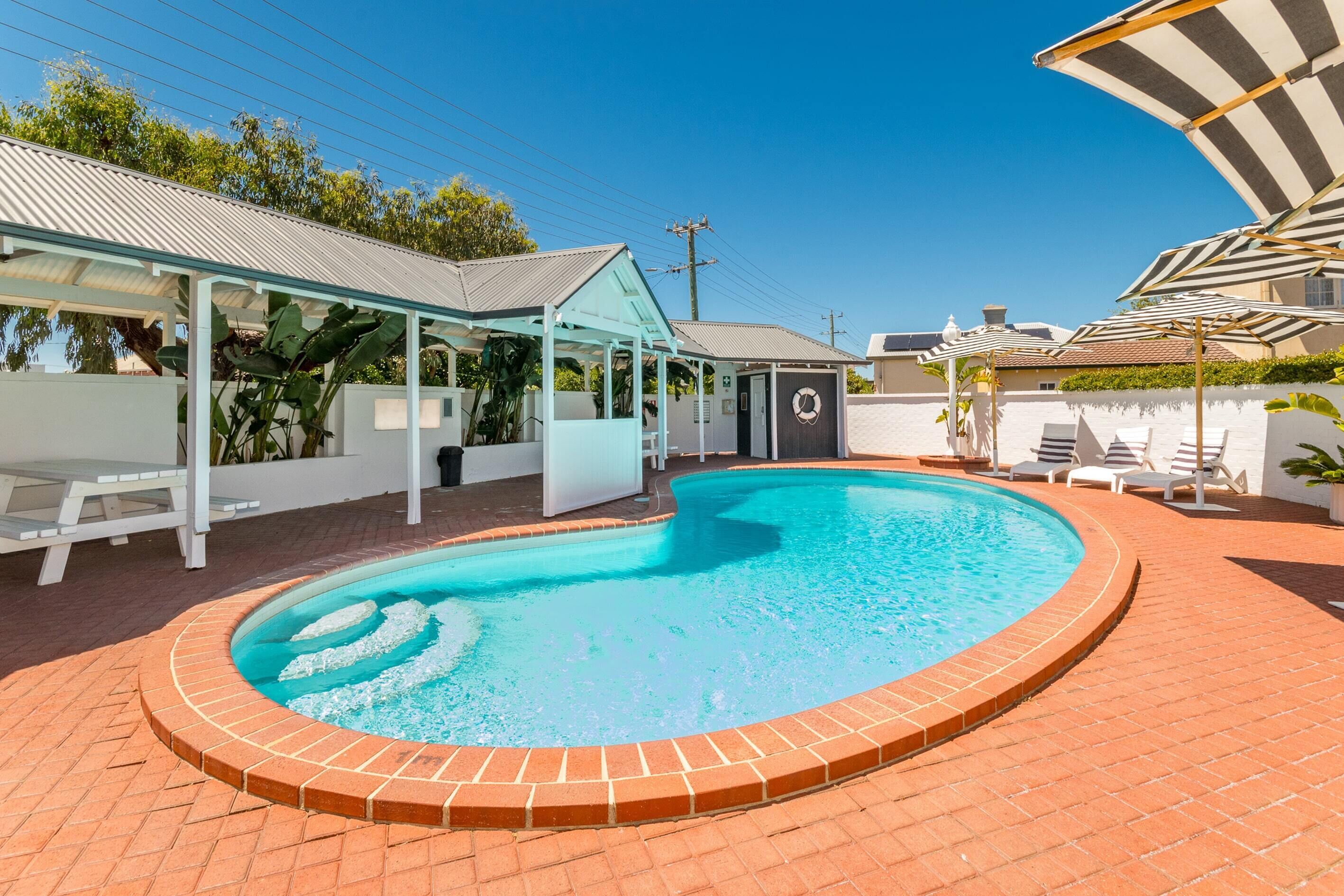 Outdoor pool, open 7:00 AM to 7:30 PM, pool umbrellas, sun loungers