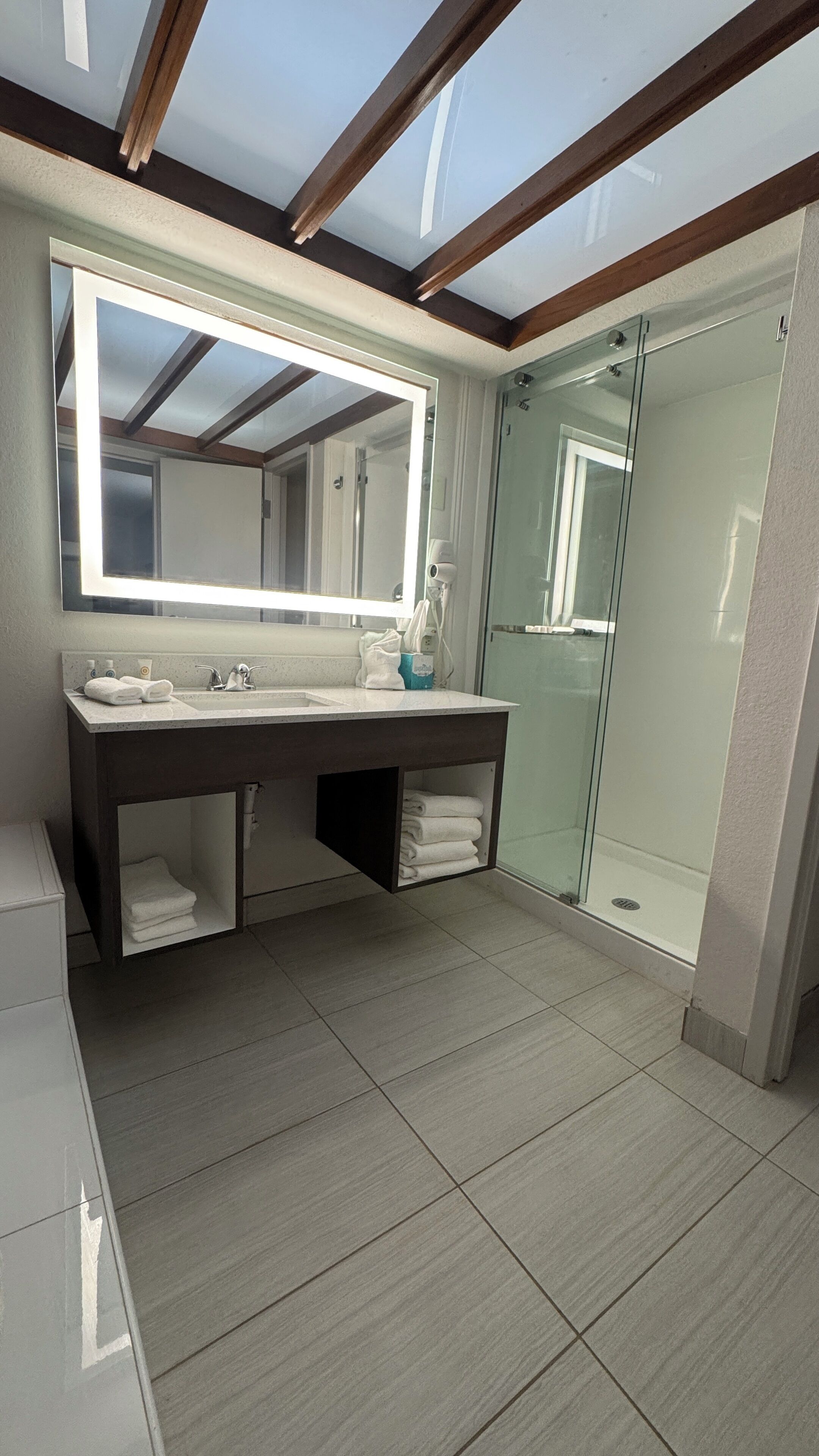 suite, 1 king bed with sofa bed, non smoking (efficiency) | bathroom | combined shower/bathtub, free toiletries, hair dryer, slippers